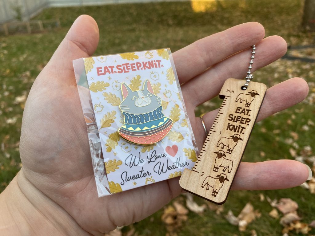 enamel pin and knitting gauge ruler