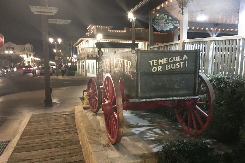Old cart with "Temecula or Bust" painted on the back