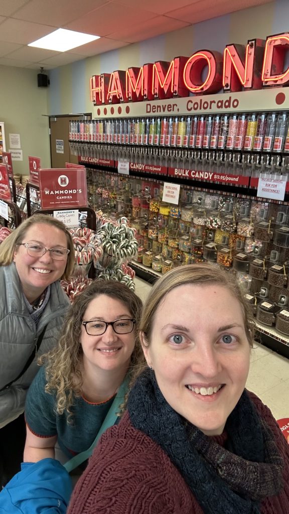 Holly, Andrea, and Amy inside the candy store at Hammond's Candies in Denver, CO